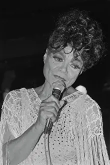 Prints of American singer and actress Eartha Kitt (1927 - 2008) performs at the Limelight in New York City, USA, circa 1987. (Photo by Michael Ochs Archives/Getty Images) Captivating Art Prints Celebrating the Iconic Performer’s Legacy: Eartha Kitt