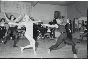 Prints of (Original Caption). Bending over with enthusiasm shapely Les Femmes look toward Eartha Kitt (left) for further instructions during a dance lesson Captivating Art Prints Celebrating the Iconic Performer’s Legacy: Eartha Kitt Giving Dance Lessons