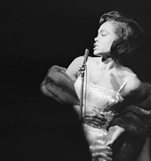 Prints of (Original Caption). New York, New York: Eartha Kitt at Persian Room, Plaza Hotel. Photo shows: Pictures of Eartha Kitt taken during her performance at the Persian Room, Plaza Hotel Captivating Art Prints Celebrating the Iconic Performer’s Legacy: Eartha Kitt Singing