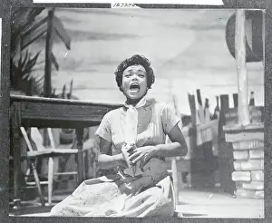 Prints of (Original Caption). Eartha Kitt is shown as she appears in the stage play, Mrs. Patterson Captivating Art Prints Celebrating the Iconic Performer’s Legacy: Eartha Kitt Sitting and Laughing