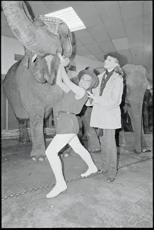 Kitt Shapiro Prints: Eartha Kitt Standing with Her Daughter and Circus Elephant
