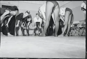 Prints of (Original Caption). As other members of the class look on. Eartha Kitt (right) dramatically interprets a routine which is seriously viewed by Joi Lansing (left) during a dance lesson Captivating Art Prints Celebrating the Iconic Performer’s Legacy: Eartha Kitt's Dance Class