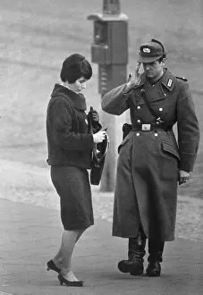 Oppression Prints: East German Policeman Checking Papers