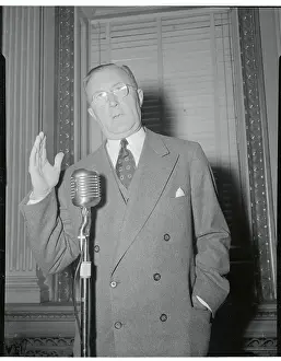 Economy Negotiator Charles E. Wilson Gesturing at Microphone