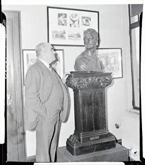Ed Barrow Admiring Bust of Lou Gehrig