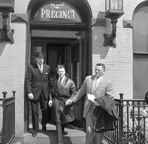 Ed Eagan and Vincent Hawkes Escorting Jacques Angelvin