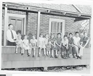 Danbury Prints: Ed Schlemmer Standing Beside His Eleven Children