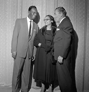 Prints of NEW YORK - MAY 16: Entertainer and pianist Nat King Cole chats with host of The Ed Sullivan Show Ed Sullivan and a woman on May 16, 1954 in New York City, New York A Musical Icon: The Ed Sullivan Show Chat