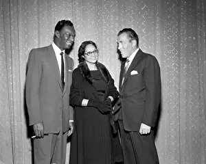 Prints of NEW YORK - MAY 16: Entertainer and pianist Nat King Cole chats with host of The Ed Sullivan Show Ed Sullivan and a woman on May 16, 1954 in New York City, New York A Musical Icon: The Ed Sullivan Show Chat