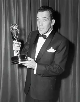 Host Prints: Ed Sullivan Holding Emmy Award