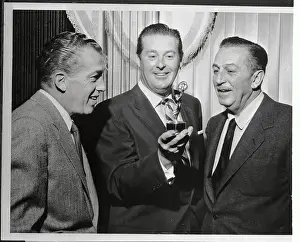 Ed Sullivan and Walt Disney Admiring Emmy Award Statue