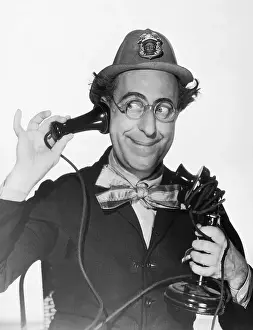 Ed Wynn Listening to Telephone