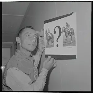 Jamaica Prints: Eddie Arcaro Holding Up Pictures of Horse Choices