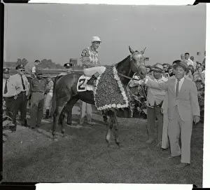 Eddie Arcaro Sitting on Native Dancer