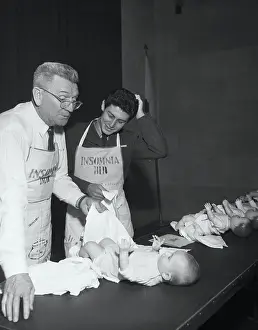 Hershey Prints: Eddie Fisher and Hershey Lewis Changing Diapers