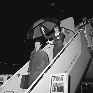 Eddie Fisher and Maureen McMullin Leaving Airplane