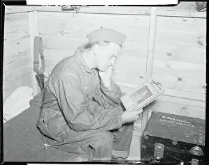Alabama Prints: Eddie Fromm Looking at Photograph