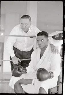 Eddie Machen with Manager Sitting in Ring