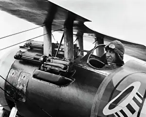 Logo Prints: Eddie Rickenbacker Sitting in Biplane