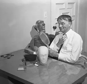 Trying On Prints: Edgar Bergen Trying on Toupee