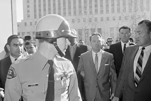 Conspirator Prints: Edgar Eugene Bradley Being Escorted by Police