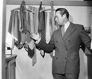 Edmund Lowe in His Closet with Neck Ties