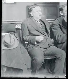 Edward E. Carrington Sitting in Courtroom