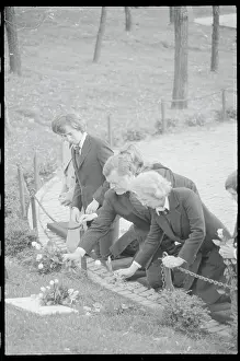 Edward and Ethel Kennedy Kneeling at Robert F. Kennedy Grave