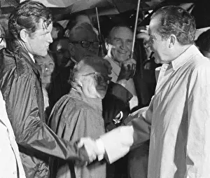 Edward Kennedy Greeting Richard Nixon in the Rain
