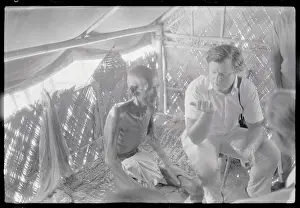 Starvation Prints: Edward Kennedy Interviewing a Refugee