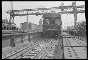 Edward M. Kennedy Standing on Train With His Arms Folded