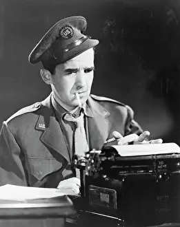 Edward R Prints: Edward R. Murrow Wearing Military Uniform and Typing
