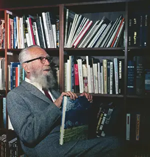 Luxembourgian Prints: Edward Steichen Posing by Bookshelf