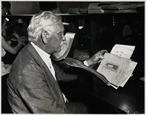 Edwin H. Bond Looking Up Patent Record