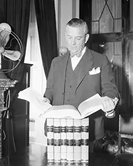 Edwin Halsey with Books of New Legislation