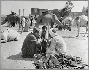 Egyptian Men Sitting on Ground