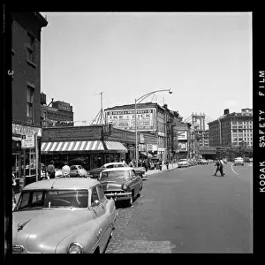 Prints of BROOKLYN, NY - MARCH 1958: An Eisenhower-Nixon billboard at the corner of Cranberry and Fulton Streets in Brooklyn Heights, in March 1958 in New York City, New York Portraits, Artworks, and Montages from a Visionary Photographer: Eisenhower-Nixon Billboard in 1950's Brooklyn Heights