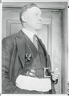 E.J. Lynch Wearing a Radio