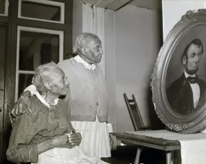 Emancipation Prints: Two Elderly Black Women Look At Portrait