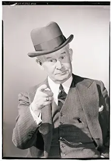 Elderly Man Wearing Suit and Tophat