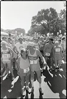 Marathon Prints: Elderly Marathon Runners Hug & Pose