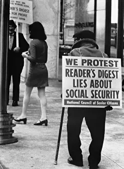 Elderly Protesters Admiring Mini-Skirted Woman