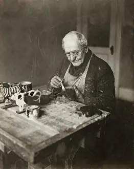 Elderly Toy Maker at Work