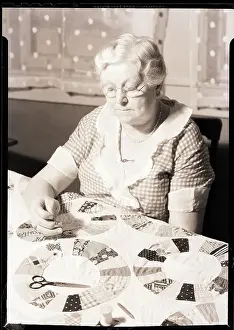 Sewing Prints: Elderly Woman Making Quilt
