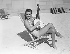 Swimmer Prints: Eleanor Holm Relaxing on Lawn with Banjo