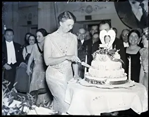 Poliomyelitis Prints: Eleanor Roosevelt Cuts Cake at Birthday Ball