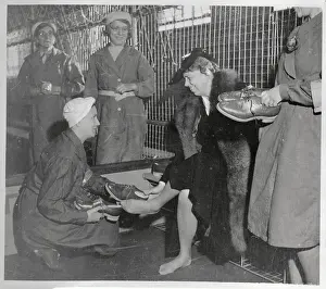 Eleanor Roosevelt Being Helped with Safety Shoes