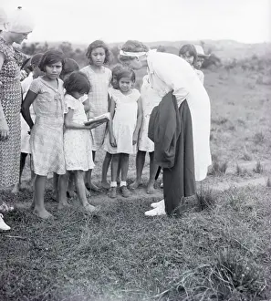 Eleanor Roosevelt Listens to Child Reciting