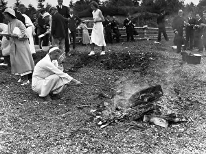 Picnic Prints: Eleanor Roosevelt Roasts Hot Dog on Camp Fire