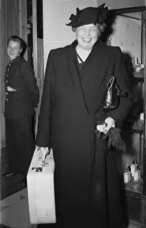 Traveling Prints: Eleanor Roosevelt Smiling and Carrying her Suitcase